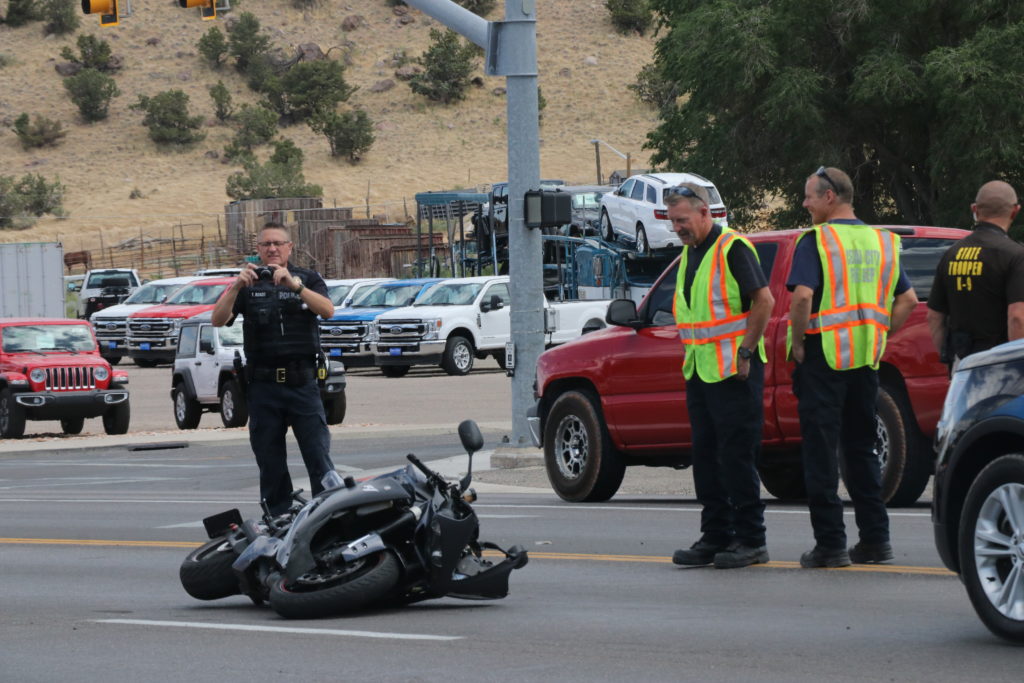 Motorcyclist brakes hard to avoid collision but still crashes Cedar